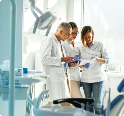dentists looking at papers